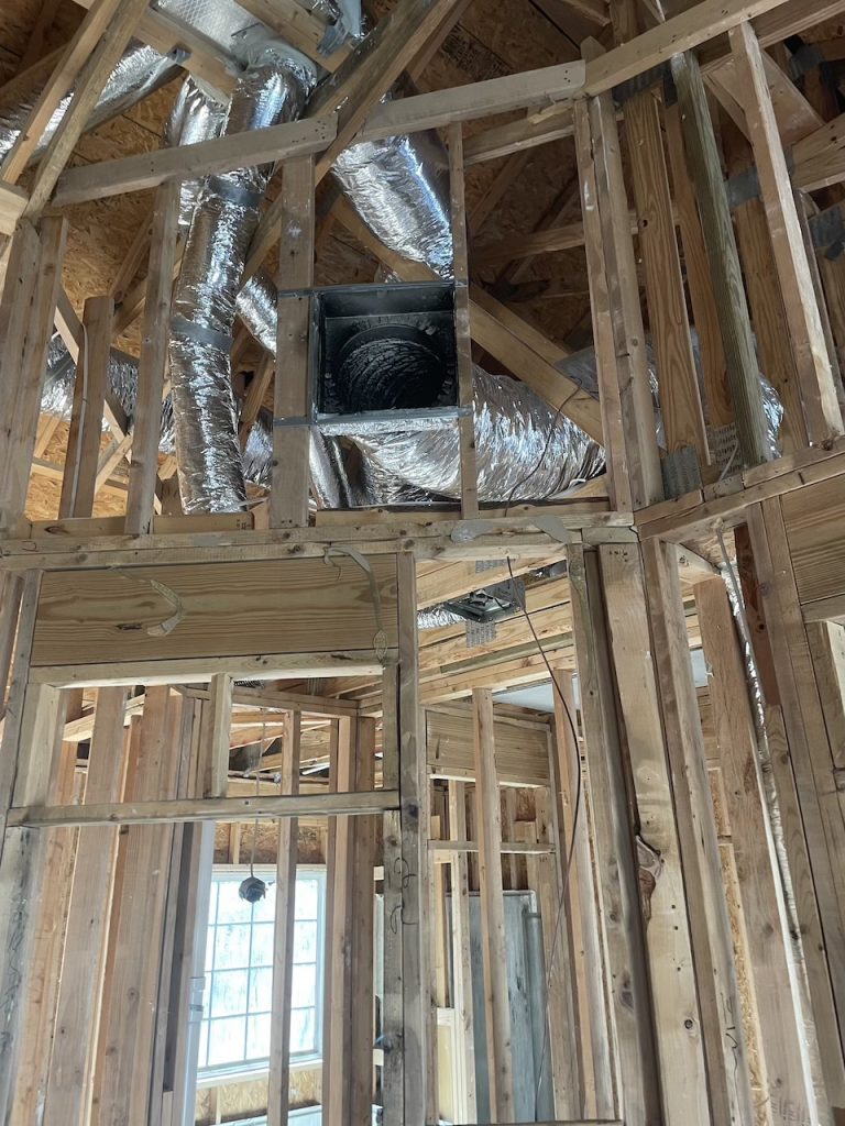 Air vents in the supporting beams of a fire damaged home.