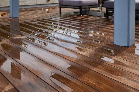 wood floor with little puddles.