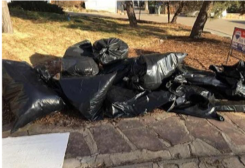 Insulation and other debris bagged sealed and ready for disposal