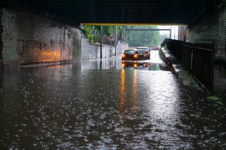 Flash flood in the middle of a road.