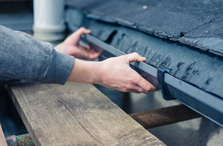 Inspect and Clean Gutters and Downspouts