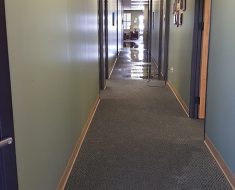 Water damage in hallway before remediation process by PuroClean Certified Restoration Specialists Centennial CO