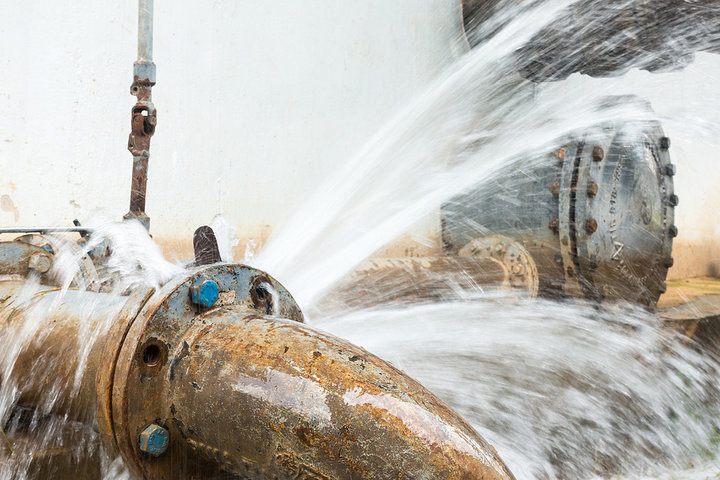 A burst water pipe.