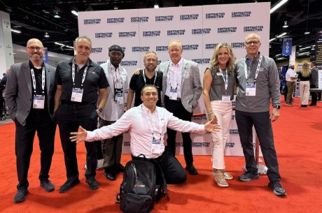 Our team posing for pictures at Contractor Connection 2024, including our owner Nilo.