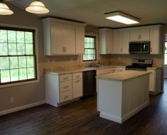 Water damage restoration after picture of kitchen.