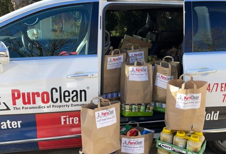 PuroClean van loaded with donations for Food Finders Food Bank