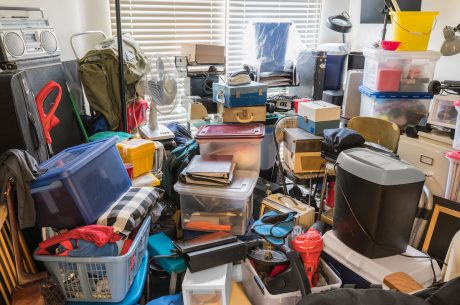 packed with boxes and other items, cleaning a horader's house