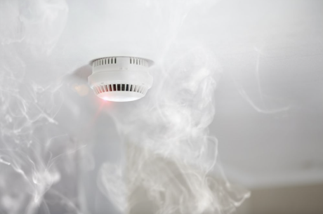 Smoke rises up to a smoke alarm in a McAllen home