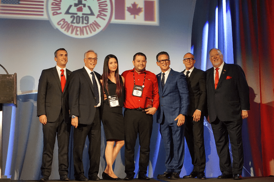 Ivan Oliver and Karina Esparza receive PuroClean Rookie of The Year Award