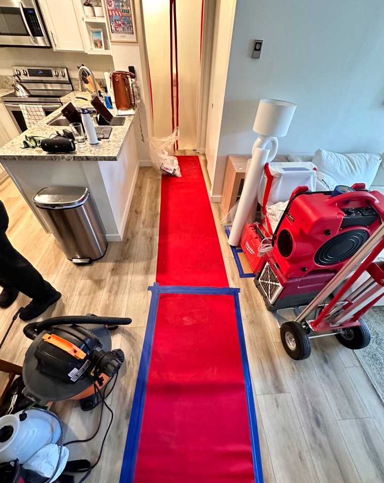 Drying equipment of a bathroom during a water damage restoration in Clairemont.