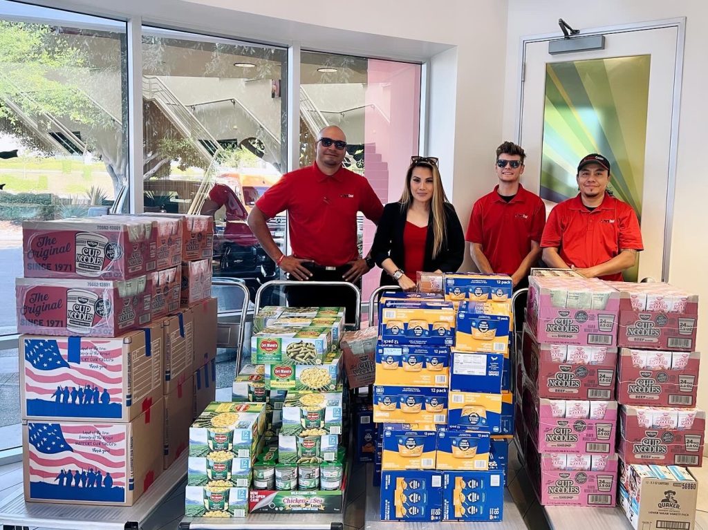 From Left: Tyrone, Marife, Ryan and Carlos dropping off our first donation of 1,059 lbs of food.