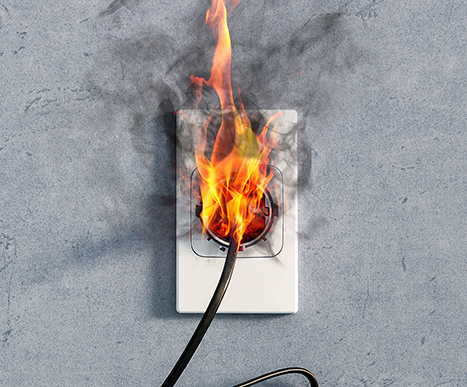 fire and smoke on electric wire plug in indoor, electric short