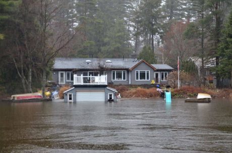 Flooded home caused by rainwater. Spring flooding prevention is important.