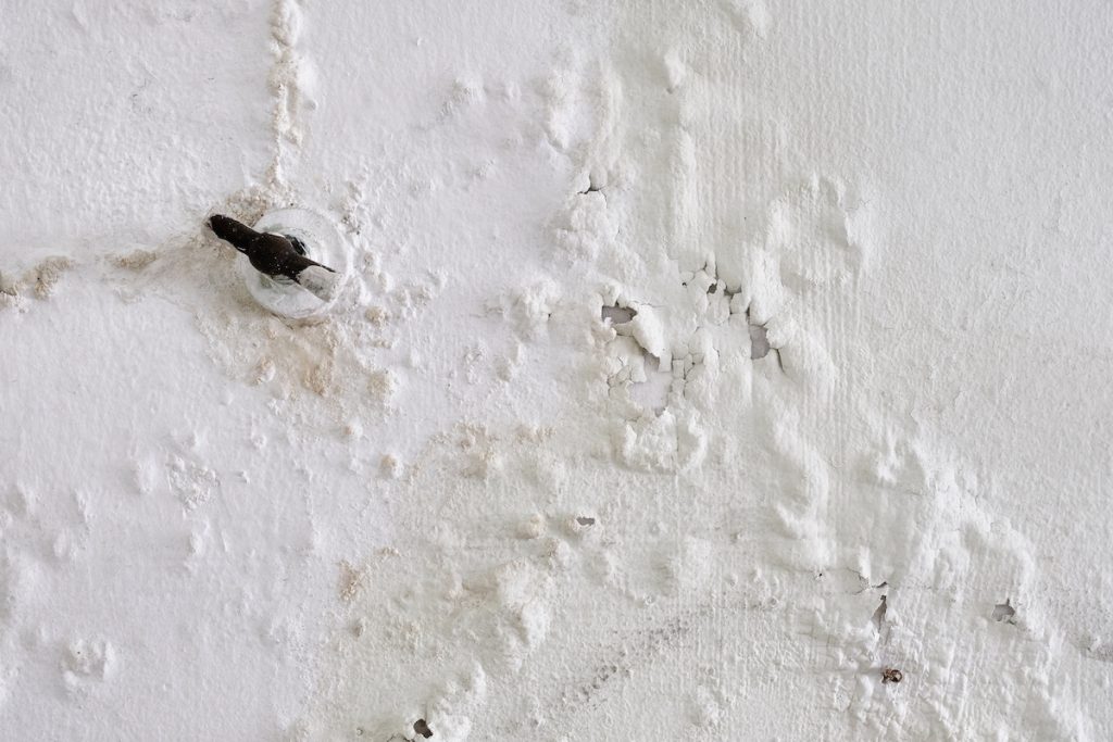 Bubbles in the paint is a sign of water damage in walls.