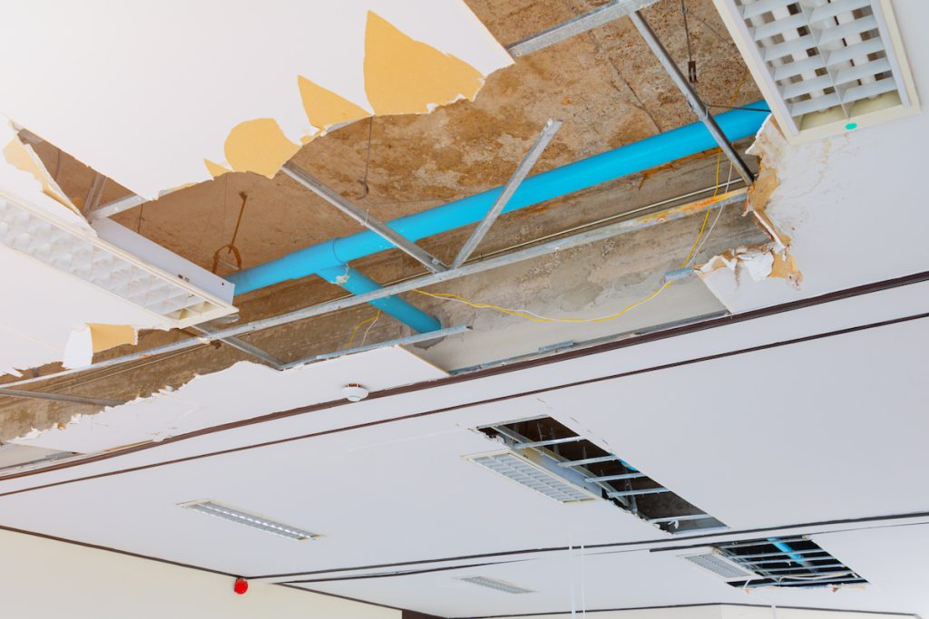 ceiling damaged by commercial roof leak