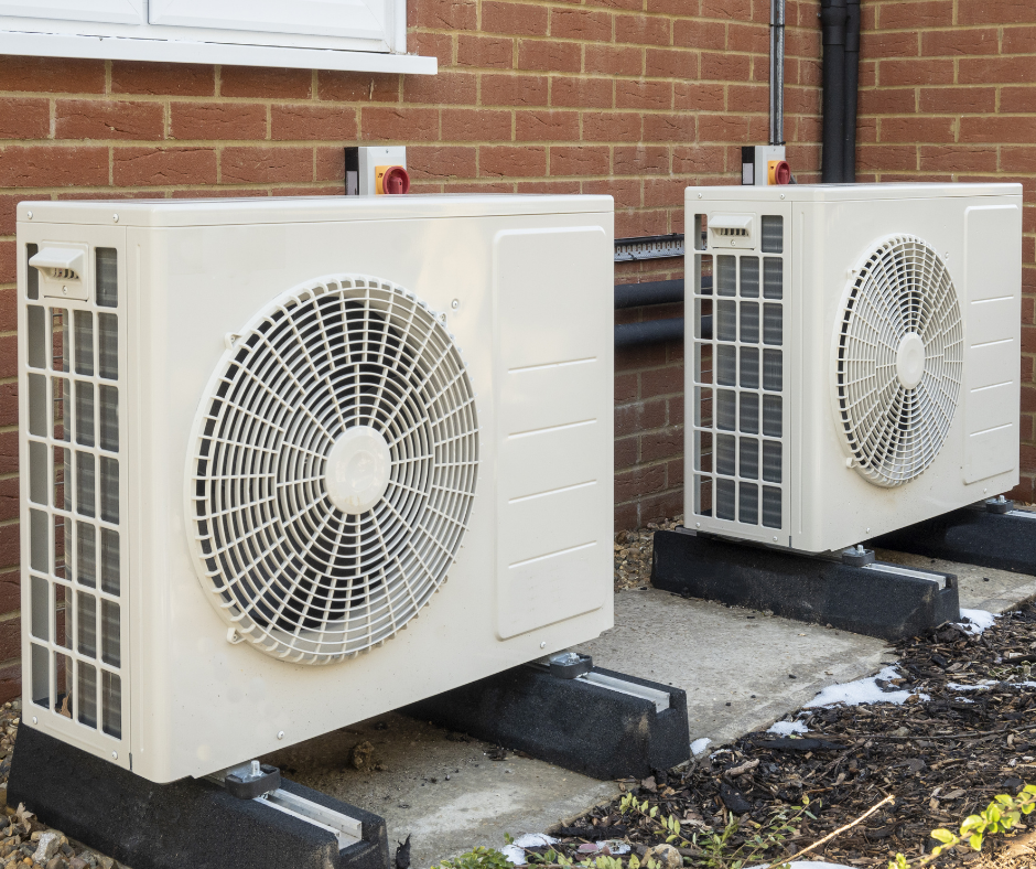 two exterior air conditioner units