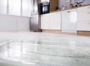 damaged floors - kitchen with water on floor