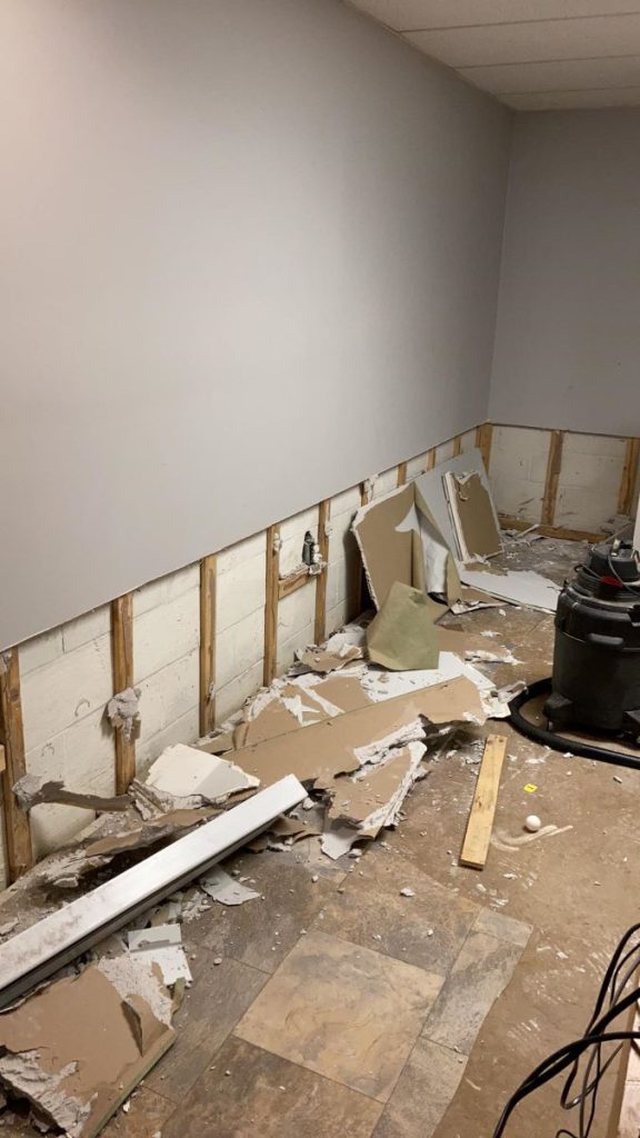 Drywall ripped out of wall during hurricane water loss restoration job.