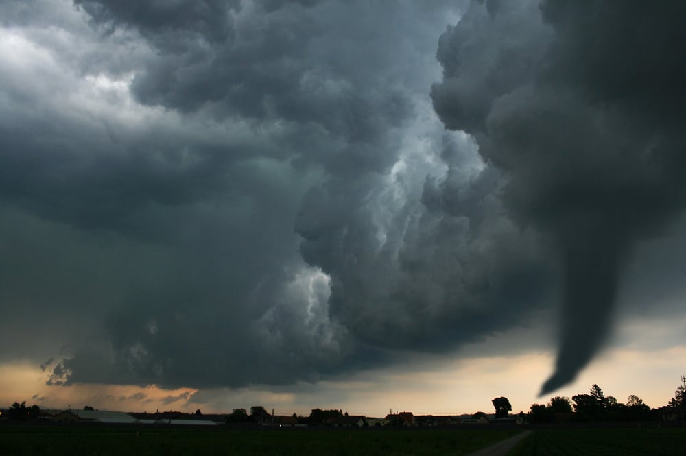 a black sky with tornado