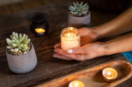 Candle inside any glass cup is the best way to keep from candle fire control